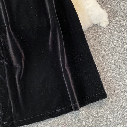 Robe vintage en velours noir à simple boutonnage et poches pour femme